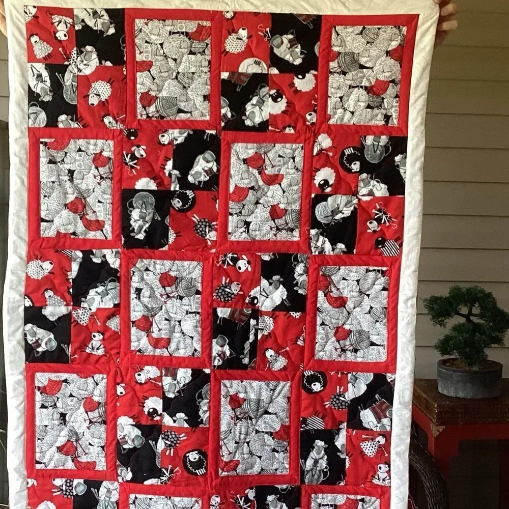 NWT. Black White and Red Sheep Lap Quilt Hand Crafted